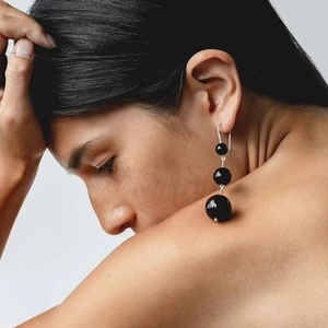 Elegant 7A black agate graduated bead drop earrings with silver hooks on model
