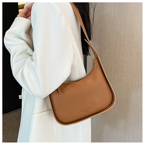 Brown semi-circle underarm bag in smooth leather featuring Fashion Bag New York print