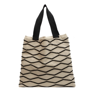 Chic knit tote bag with black zigzag patterns and durable wide straps for daily use
