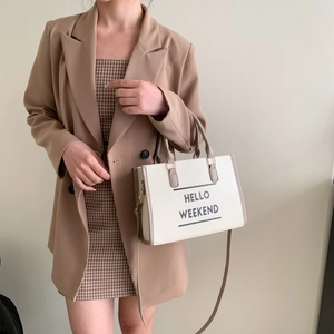 Sac fourre-tout crème pour femme avec imprimé Hello Weekend et anses marron pour le bureau