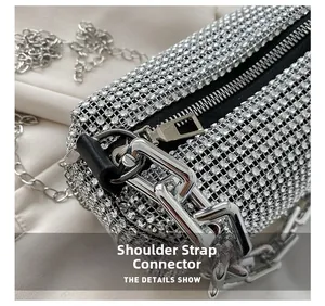 Close-up of the silver shoulder strap link buckle on a luxury rhinestone evening bag