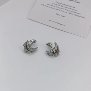 Orecchini a mezzaluna in argento 925 design francese con finitura a trama lavica