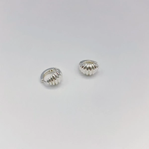 Silver croissant style hoop earrings with elegant vertical ridges in a minimalist design