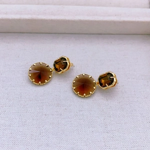 Elegant gold-plated stud earrings featuring amber citrine stones in a vintage design