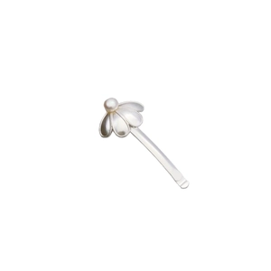 Ethnic style silver flower hair clip featuring a white pearl inlay on a white background