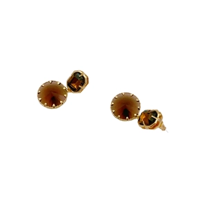 Elegant gold plated drop earrings featuring faceted tea crystal and brown amber stones