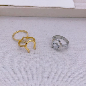 Elegant gold and silver horseshoe rings with cubic zirconia inlay on fine circular bands