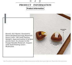 Detailed view of brown leather cord wrapped triangle earrings with 18K gold plated brass
