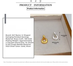 Detail of U-shaped gold earrings showing 18K gold plating and S925 silver needle