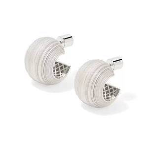 Close-up of C-shaped silver earrings with brushed texture and inner mesh detail