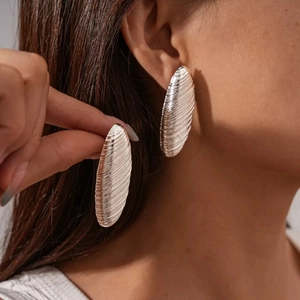 French vintage silver spiral oval stud earrings with elegant brushed metal texture