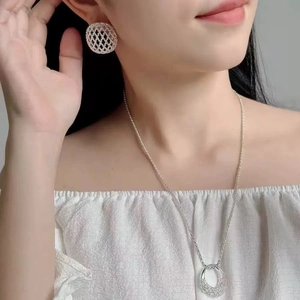 Gold plated mesh hollow jewelry set featuring sparkling necklace and ball stud earrings