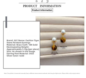 Detail of tiger eye and pearl earrings with 18K gold plating and S925 silver pins