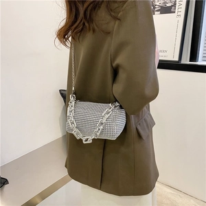 Silver rhinestone cylinder bag with thick chain handle and long shoulder strap
