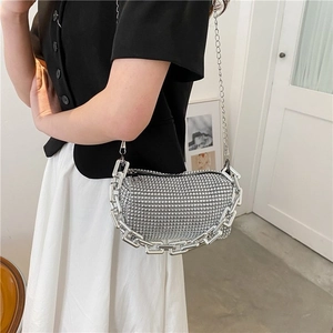 Elegant silver rhinestone pillow bag with thick chain handle and metal shoulder strap