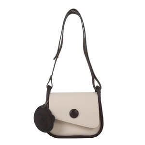 Retro contrast saddle bag in cream and brown with a cute leather bear charm