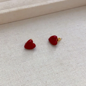 Vintage red enamel heart stud earrings with hammered gold finish for women