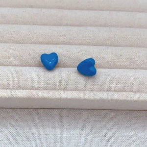 Royal blue enamel heart stud earrings with gold plating and hammered texture surface