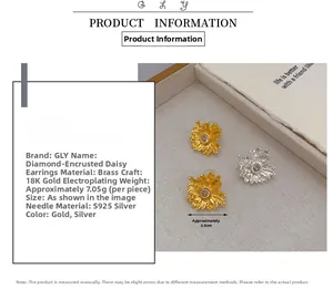 Detail view of 18K gold daisy earrings with zircon inlay and S925 silver posts