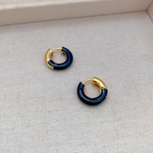 French style gold plated hoop earrings with dark blue enamel inlay on textured fabric