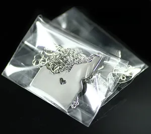 Collana con ciondolo contorno dello stato dell'Idaho in acciaio argento e cuore in confezione