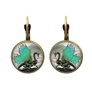 Orecchini in bronzo antico con cabochon in vetro verde e motivo di drago fantasy