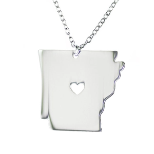 Polished silver Arkansas state map necklace with heart cutout on a delicate O-chain