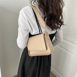Minimalist beige shoulder bag for women with fine leather texture and gold hardware
