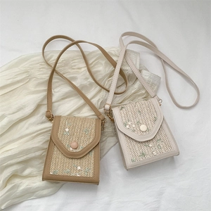 Handcrafted straw woven crossbody bags with floral embroidery in khaki and cream white