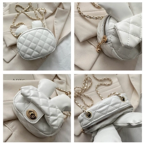 Detail view of white quilted PU leather rabbit ear bag with golden chain and twist lock