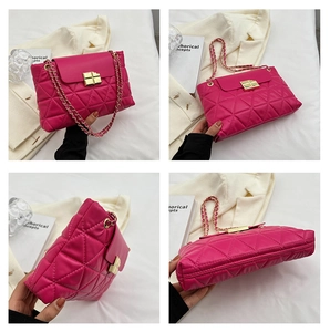 Detailed views of magenta quilted crossbody bag with gold chain and metal twist lock closure