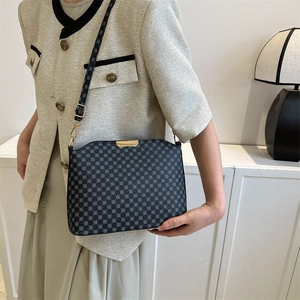 Classic patterned crossbody bag for women with gold hardware and adjustable strap