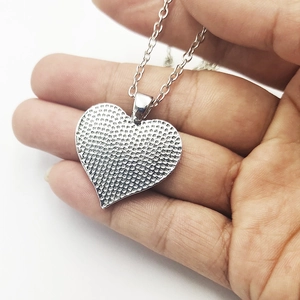 Silver heart pendant necklace for daughter with honeycomb textured back for women