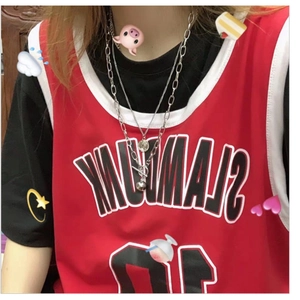 Hip-hop style red Slam Dunk basketball vest worn with layered silver pendant necklaces