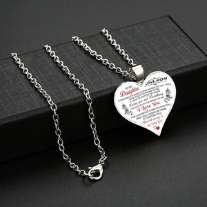 Silver heart pendant necklace for wife or son with floral engraving in a black jewelry box