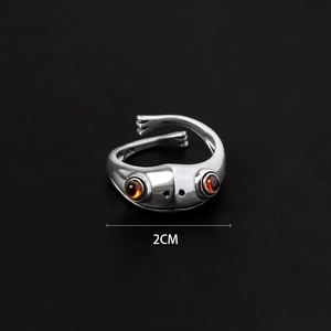 Macro detail of S925 hallmark on adjustable frog ring with red carnelian eyes