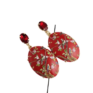 Vintage oval hummingbird drop earrings with red enamel flower patterns and crystals