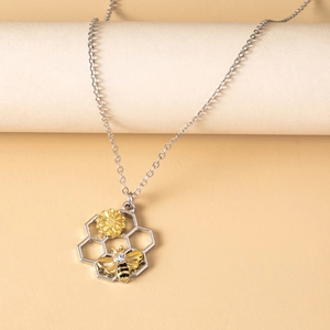 Minimalist silver chain necklace with golden bee and sunflower honeycomb pendant
