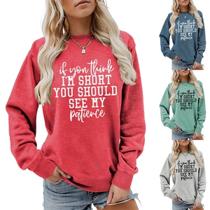 Detailed grid view showcasing the slogan print sweatshirt in red, blue, green, and grey