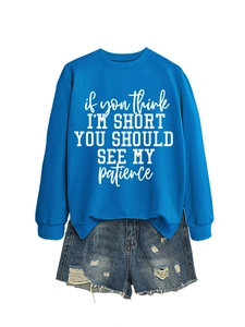 Blue sweatshirt with funny letter print paired with distressed denim shorts for casual style