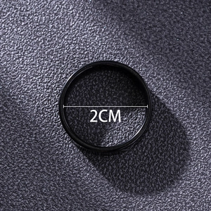 Detailed top view of a black stainless steel ring showing a 2cm inner diameter measurement