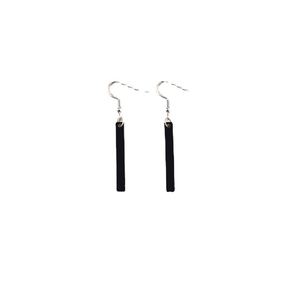 Minimalist rectangular black drop earrings with silver hooks shown on white background