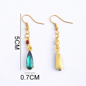 Detailed view of emerald drop earrings with gold hooks showing 5cm length dimensions