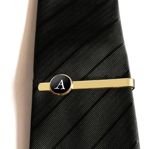 Elegant gold-tone stainless steel tie clip with letter A on black circular inlay