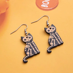 Halloween black cat skull earrings with pink bone patterns on orange background