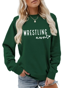 Detail of dark green crewneck sweatshirt with Wrestling Aunt print and ribbed cuffs