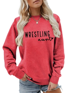 Close-up of red crewneck sweatshirt with Wrestling Aunt text and heart graphic