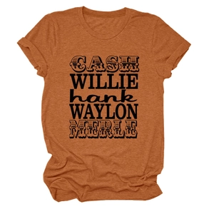 Détail d'un t-shirt orange vintage avec graphique des noms de chanteurs de country