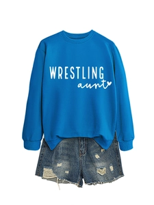 Detail of blue crewneck sweatshirt with Wrestling Aunt print and ribbed sleeve cuffs