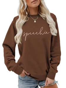 Close-up of speechie text print on coffee brown sweatshirt with ribbed cuffs